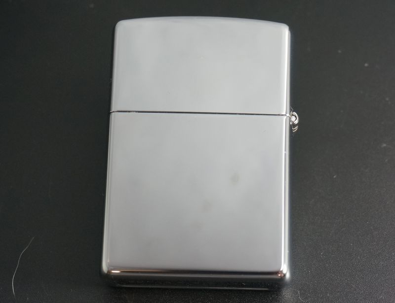 画像: zippo FOLLOW ME 2006年製造