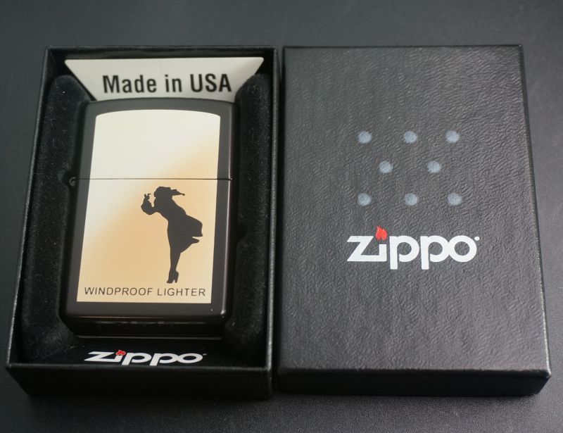 画像: zippo WINDY シルエット オレンジ 黒マット